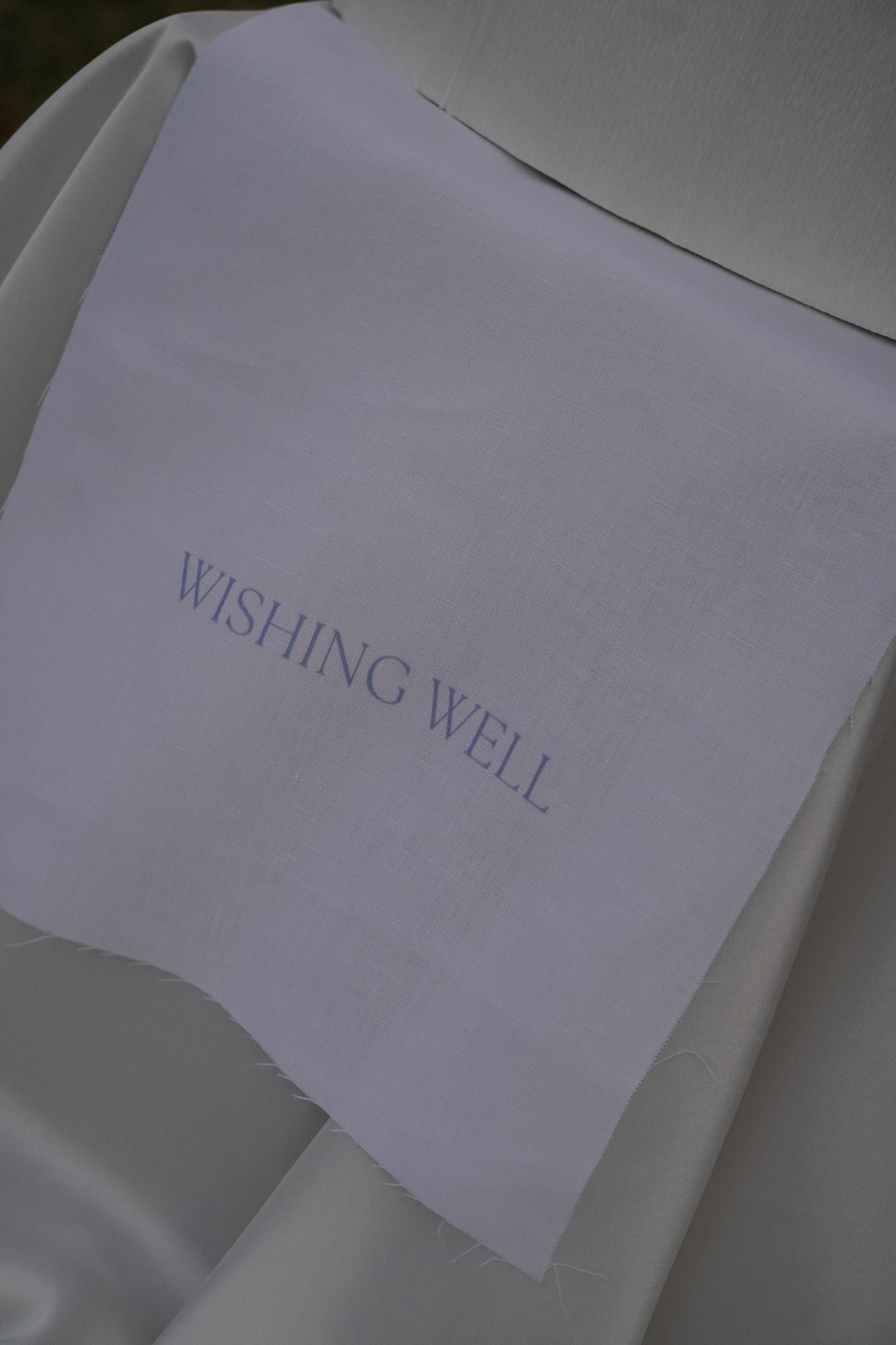 Linen wishing well sign