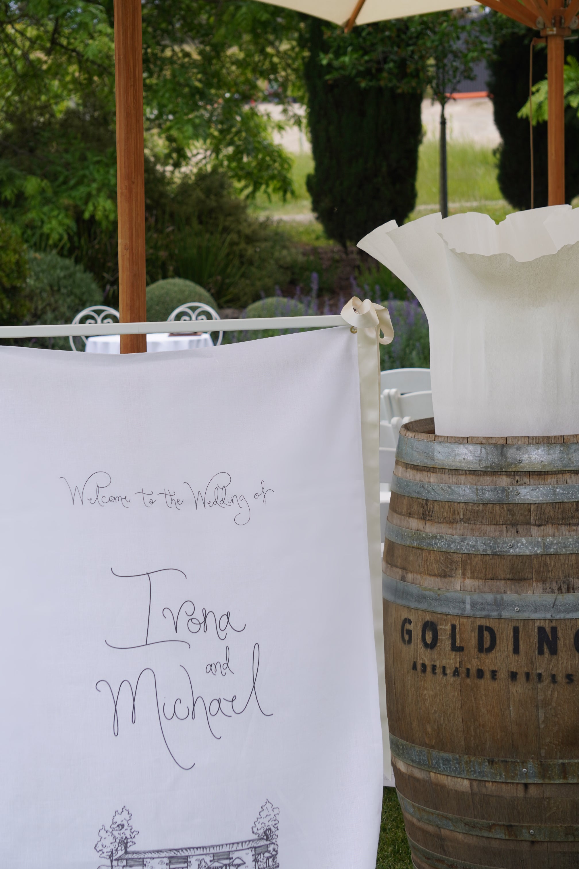 Linen welcome sign with custom sketched venue