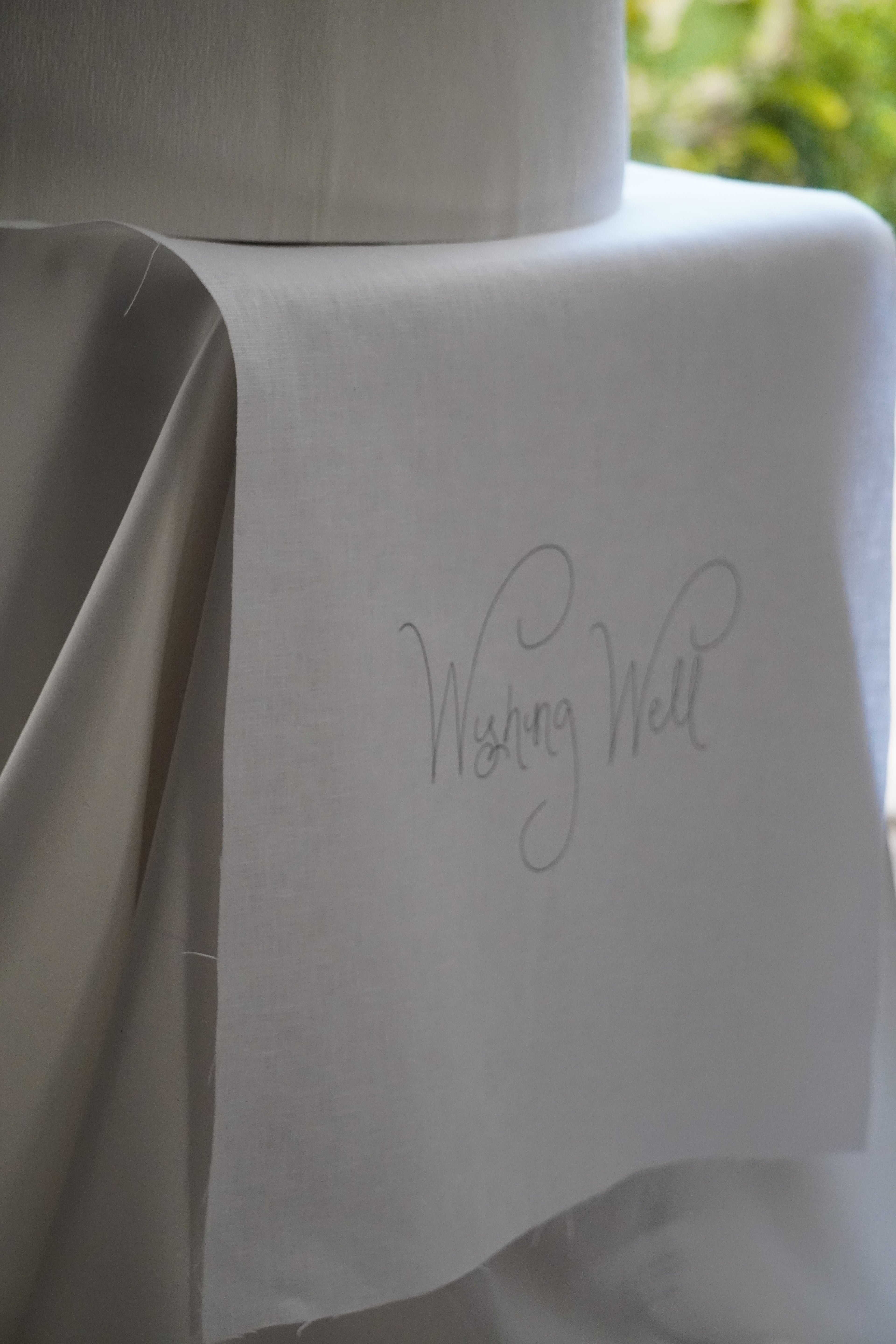 Linen wishing well sign