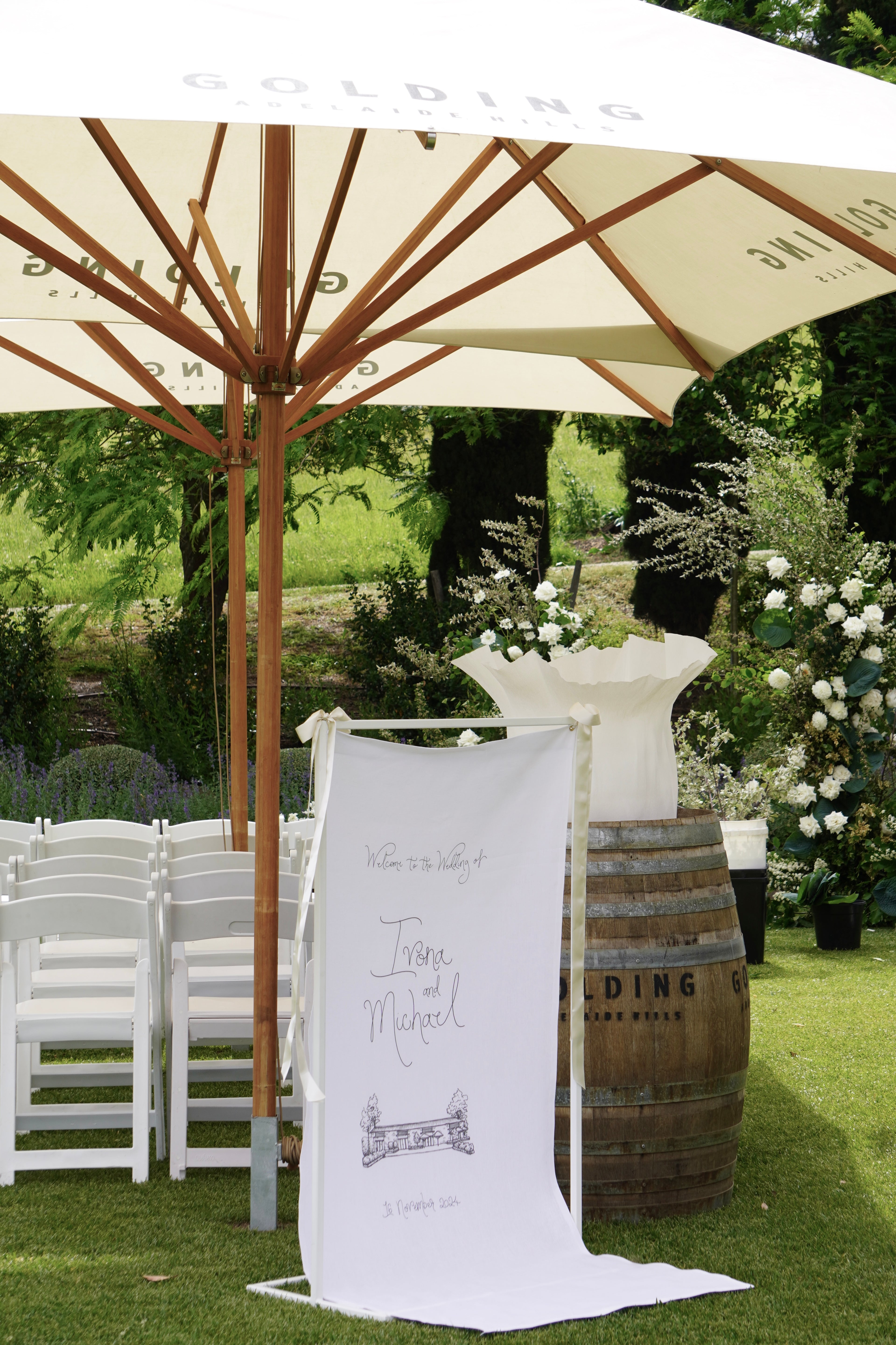 Linen welcome sign with custom sketched venue