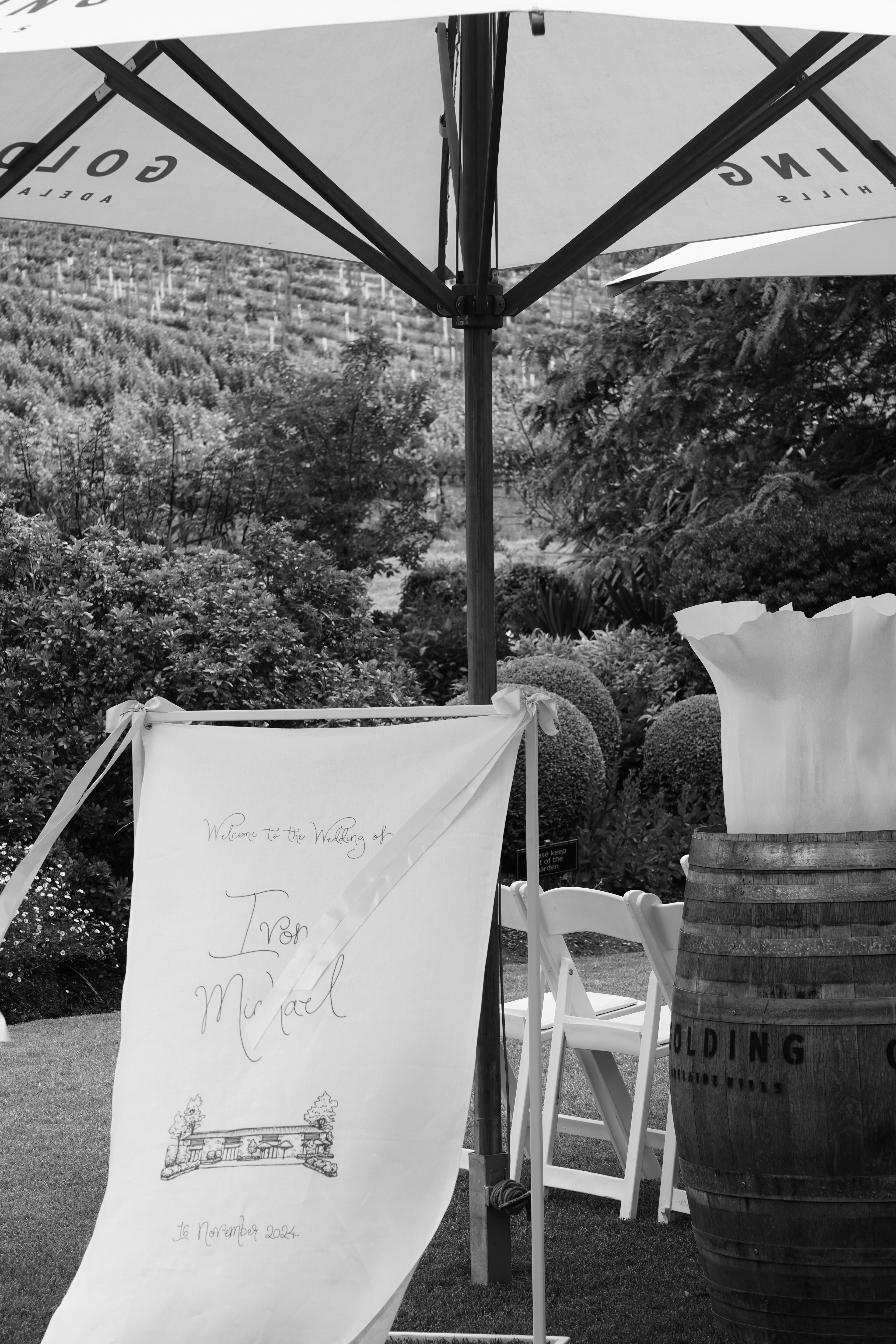 Linen welcome sign with custom sketched venue